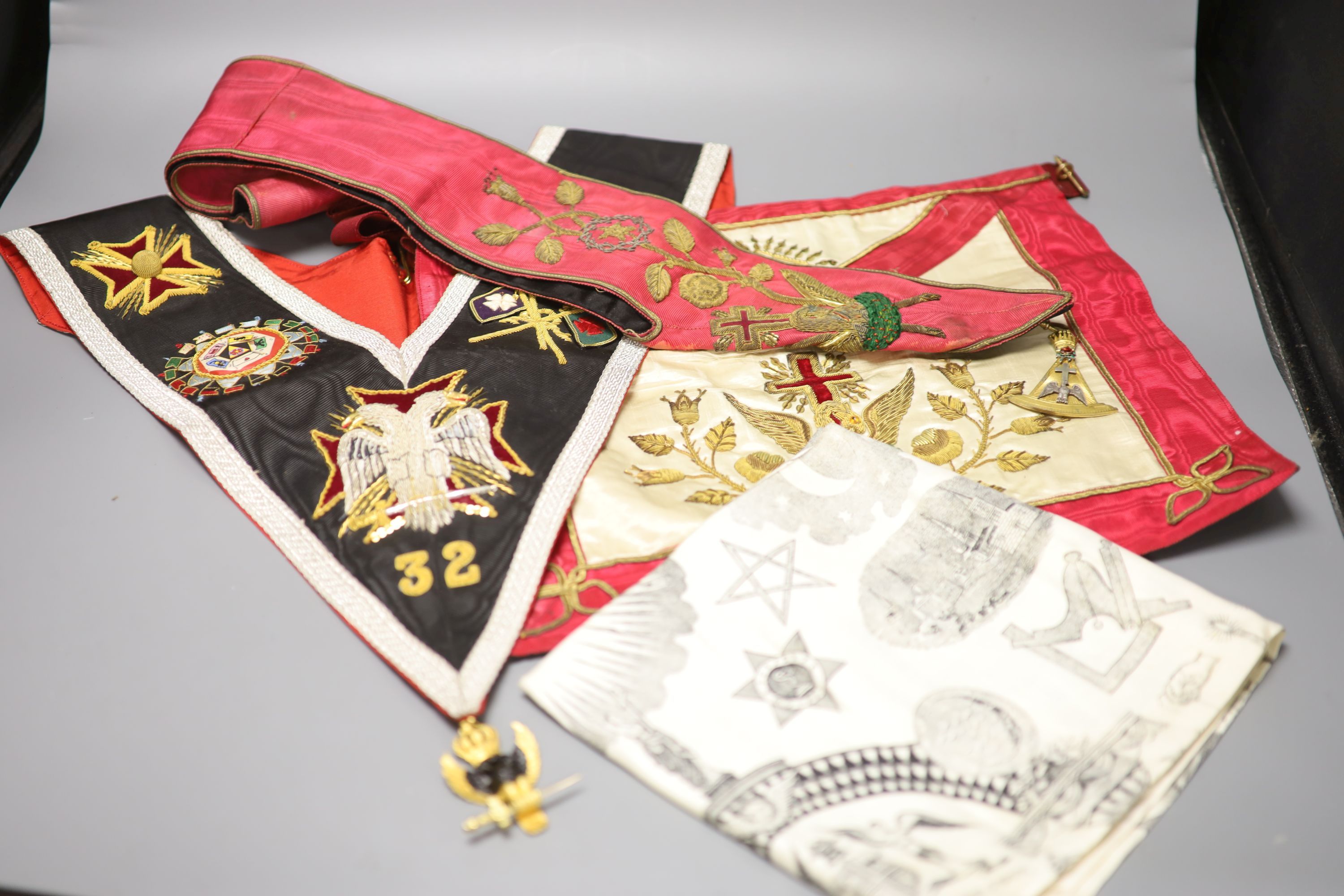 A late 19th early 20th century Masonic bullion worked embroidered and matching sash, plus a modern sash with silver gilt medallion and